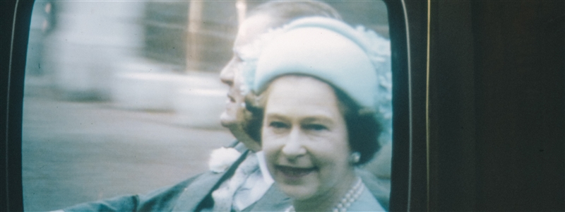 A television screen showing the Queen of England at the marriage of Prince Charles to Diana Spencer, a 1980s 35mm film slide photo. Photo by 
Annie Spratt via Unsplash.